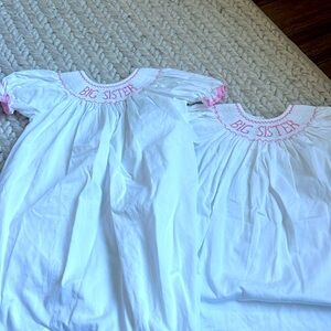 Souther sunshine smocked “big sister” dress.

5t

$25